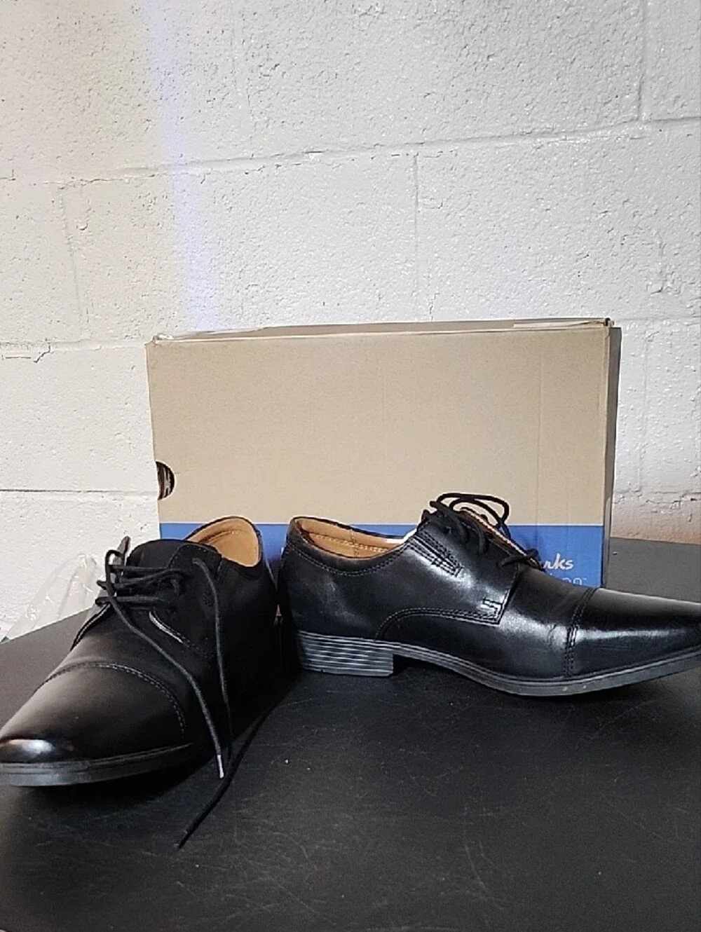 Clarks polished black